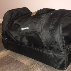 Timberland Rolling Duffel bag Suitcase.